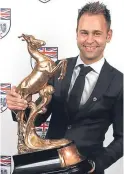  ??  ?? Jonny Adam with the Fairfield Trophy.