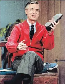 ?? GENE J. PUSKAR THE ASSOCIATED PRESS ?? Fred Rogers rehearses the opening of his PBS show "Mister Rogers' Neighborho­od" during a taping June 28, 1989, in Pittsburgh.