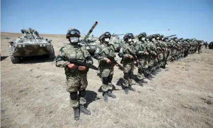  ?? Photograph: Anadolu Agency/Getty Images ?? Turkish and local soldiers in joint exercises in Azerbaijan last month.