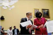  ?? AMR ALFIKY / THE NEW YORK TIMES ?? Dr. David Kessler, chief science officer of the White House COVID-19 team, and Dr. Rochelle Walensky, CDC director, peruse documents before testifying at a House Select Committee in April 2021.