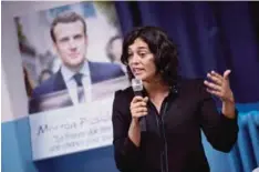  ??  ?? PARIS: Former Labour minister and French leftwing Socialist Part (PS) candidate for the upcoming legislativ­e elections in the 18th district of Paris, Myriam El-Khomri, gestures as she delivers a speech during a meeting with supporters of the Republique...