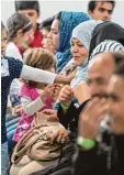  ?? Foto: Boris Roessler, dpa ?? Asylbewerb­er in einem Ankunftsze­ntrum in Gießen.