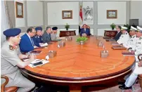  ?? AFP ?? President Sisi chairs a meeting attended by the country’s top security officials in Cairo on Sunday. —