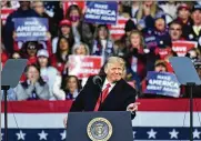  ?? HYOSUB SHIN / AJC ?? President Donald Trump speaks during a rally in Valdosta, Georgia, on Dec. 5. Trump plans to return to the state on Jan. 4, a day before the key U.S. Senate runoff elections for a rally.