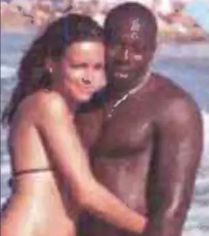  ??  ?? Holiday: Boumeddien­e with her husband Amedy Coulibaly on a beach