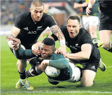  ?? Picture: PHIL WALTER/GETTY IMAGES ?? TRY TIME: Aphiwe Dyantyi scores one of his two tries during the Rugby Championsh­ip match between the All Blacks and the Springboks at the Westpac Stadium on Saturday