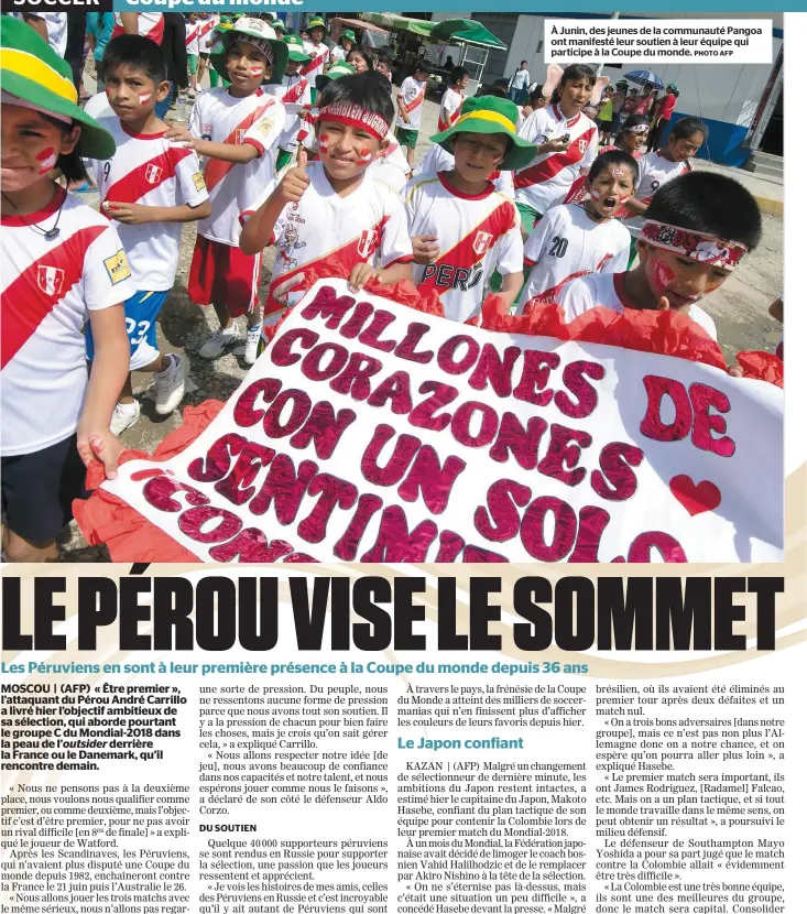  ?? PHOTO AFP ?? À Junin, des jeunes de la communauté Pangoa ont manifesté leur soutien à leur équipe qui participe à la Coupe du monde.