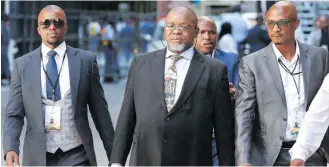  ?? Pictures: EPA-EFE ?? MAIN MAN. Minister of Mineral Resources Gwede Mantashe, centre, arrives ahead of the opening of parliament ceremony yesterday in Cape Town.