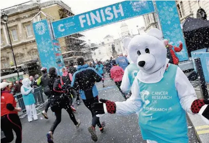  ??  ?? The finish of last year’s London Cancer Research winter run – now the race is coming to Greater Manchester