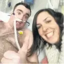  ??  ?? THUMBS UP Ali and his wife Catriona after his operation