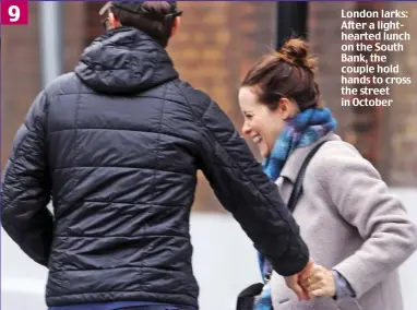  ??  ?? 9
London larks: After a lightheart­ed lunch on the South Bank, the couple hold hands to cross the street in October