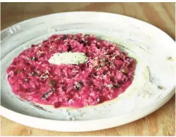  ??  ?? Happily, this arresting beetroot risotto tastes as good as it looks.