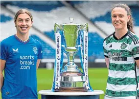  ?? ?? Rangers’ Nicola Docherty and Celtic’s Kelly Clark with the trophy.