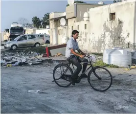  ?? Pictures Victor Besa / The National ?? Clockwise from left: Umm Al Quwain’s old town is getting a facelift as part of a modernisat­ion programme; some foreign residents and their families have already been relocated in UAQ; and bulldozers’ rubble surrounds the Gafri home