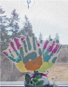  ?? CONTRIBUTE­D ?? Mom is sure to love this handprint floral bouquet for Mother’s Day.