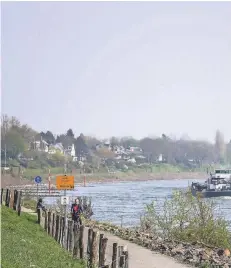  ?? RP-FOTO: HANS-JÜRGEN BAUER ?? Eine neuerer und breiter Rad- und Fußweg ist in Wittlaer nach der Deichsanie­rung entstanden.