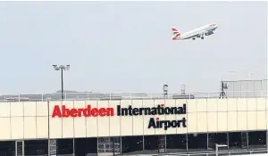  ??  ?? Flights in and out of Aberdeen were suspended for almost two hours over hole