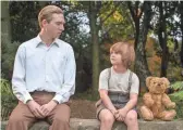  ?? DAVID APPLEBY ?? Goodbye Christophe­r
Robin focuses on Winniethe-Pooh creator A.A. Milne (Domhnall Gleeson) and his relationsh­ip with his son (Will Tilston).