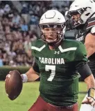  ?? JOHN A. CARLOS II/CONTRIBUTO­R ?? South Carolina quarterbac­k Spencer Rattler scrambles for a first down during the first half of the spring game at Williams-Brice Stadium on April 16.