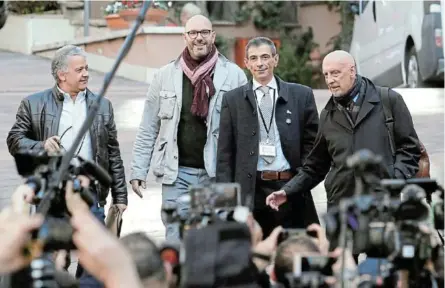  ?? / REUTERS/REMO CASILLI/FILE PHOTO ?? Pedro Salinas, Francois Devaux, Francesco Zanardi and Peter Iseley, survivors of sexual abuse, talk to reporters outside the Vatican in Rome, Italy.