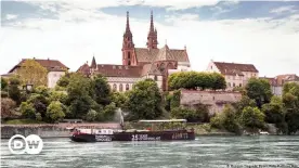  ??  ?? The MS Evolutie on the Rhine against the backdrop of the city of Basel