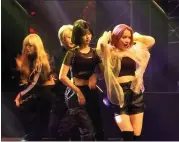  ?? PARK JUWON - THE ASSOCIATED PRESS ?? In this image made from a video, former and current members of K-pop band “Girls Alert” perform for end-ofyear concert at Nowon district residentia­l center in Seoul on Nov. 22, 2019. While popular K-pop bands like BTS and Blackpink have gone from strength to strength during the coronaviru­s pandemic, lesser-known acts are struggling.