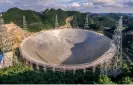  ??  ?? This photo shows the Five-hundredmet­er Aperture Spherical Telescope in southwest China.
SPACE & PHYSICS