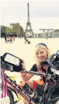  ??  ?? Always there Elizabeth Anne rode entire journey to Eiffel Tower with a photo of her beloved son