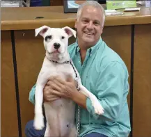  ?? COURTESY OF MARIN HUMANE ?? Lucy the dog reunites with her guardian after being lost.