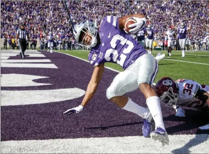  ?? IAN MAULE/TULSA WORLD VIA THE ASSOCIATED PRESS ?? Kansas State wide receiver Joshua Youngblood (23) scores a touchdown against Oklahoma safety Delarrin Turner-Yell (32) during the first half of an NCAA football game at Bill Snyder Family Stadium in Manhattan, Kan., Saturday, Oct. 26, 2019.