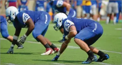  ??  ?? Courtesy Widener University Chad Gravinese, right, has become a force at defensive end for Widener, leading the Pride with six sacks and earning a spot on the All- MAC first- team defense. Unbeaten Widener opens the NCAA Division III playoffs at home...