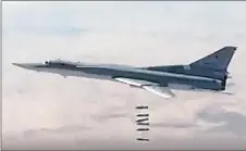  ?? AP PHOTO ?? A Russian long-range Tu-22M3 bomber strikes the Islamic State targets in Syria on Sunday, Dec. 3, 2017. Syria’s main Kurdish forces has declared that they have successful­ly cleared areas east of the Euphrates river of Islamic State militants, with help...