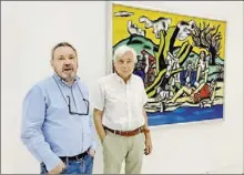  ?? - Crédits : Hélène Marty ?? Benoît Decron et Maurice Fréchuret, commissair­es de l’exposition, devant le célèbre tableau « La Partie de campagne».