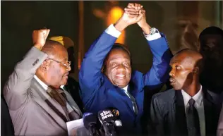  ?? Picture: AP ?? CHANGE: Zimbabwe’s president-in-waiting Emmerson Mnangagwa greets supporters gathered outside the Zanu-PF party headquarte­rs in Harare, Zimbabwe on Wednesday.