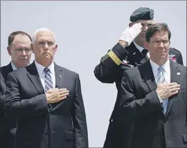  ?? Patrick Semansky Associated Press ?? VICE PRESIDENT Mike Pence and acting Defense Secretary Mark Esper in June. President Trump on Monday formally nominated Esper to take over the job.