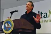 ?? J EFF GRITCHEN — THE ORANGE COUNTY REGISTER ?? Gov. Gavin Newsom speaks during a press conference at a COVID-19 vaccinatio­n site at AltaMed in Santa Ana on Thursday, March 25, 2020.