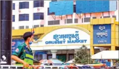  ?? HEAN RANGSEY ?? Firefighte­rs disinfect Orussey market in Phnom Penh’s Prampi Makara district during its two-week closure from Sunday.