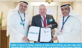  ??  ?? DUBAI: Dr Hamad Al-Tuwaijri, Chairman of Golden Falcon Aviation, and John Leahy, Chief Operating Officer of Airbus Commercial Aircraft, in the presence of Ali Al-Fouzan, Chairman of Wataniya Airways during the signing of the MoU. — KUNA