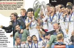  ?? GETTY IMAGES ?? titles
Real have won in the Champions League era, the first team to do so Before the European Cup switched to the Champions League format in 1992, Real won five straight titles from 1956 to 1960 Real
Madrid players celebrate their fourth Champions...