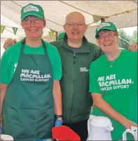  ?? 08_a34mas36 ?? Macmillan volunteers Carol Small and Alison Whitefield at Mid Argyll Show with the close-cropped MP for Argyll and Bute.