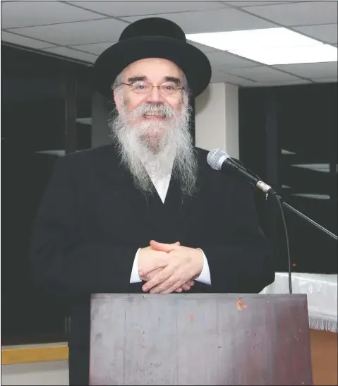  ?? (Courtesy Photo/Joel Friedman) ?? Rabbi Avrohom Pinter makes a speech at Canvey Island, in Essex, southeast England. When the British government ordered a lockdown to slow the spread of coronaviru­s, Pinter went door-to-door to deliver the public health warning to the ultra-Orthodox Jews in northeast London.