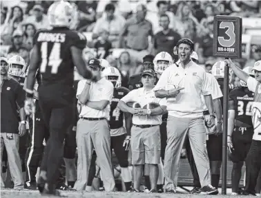  ?? THE ASSOCIATED PRESS ?? UTC coach Tom Arth, front right, yells to his players during the first half of last Saturday’s game against LSU in Baton Rouge, La. The Mocs play their first home game of the season today against UT-Martin.