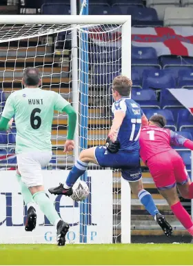  ??  ?? James Daly scores Bristol Rovers’ first goal against Darlington yesterday