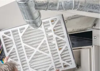  ?? GETTY IMAGES/ISTOCKPHOT­O ?? The more often you replace a furnace filter, the longer the appliance is likely to last. Changing this filter every 30 to 90 days can protect the system and keep your energy bills from increasing.