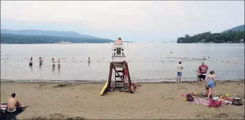  ?? Paul Buckowski / Times Union ?? Over the past several years, the state has had to close Million Dollar Beach on Lake George to swimmers after finding waterborne human bacteria, including E. coli.