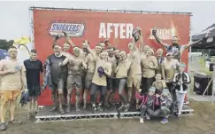  ??  ?? Nicole with her colleages and friends after the Tough Mudder