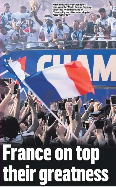  ??  ?? Party time: the French players, who won the World Cup on Sunday, celebrate with their fans on Champs-Elysee after returning to Paris yesterday