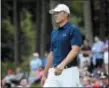  ?? STEW MILNE — THE ASSOCIATED PRESS ?? Jordan Spieth walks off the tee on the 17th hole during the final round of the Travelers Championsh­ip last weekend. Spieth has not finished closer than 12 shots of the lead in his last seven tournament­s since the Masters.