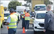  ?? Picture: Henk Kruger/African News Agency/ANA ?? BLITZ: The festive season roadblocks, which started on Borcherds Quarry Road, continued, with lawbreaker­s netted at various locations around the city.