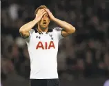  ?? Ian Kington / AFP / Getty Images ?? Tottenham striker Harry Kane reacts to his miss in a critical 1-0 loss at West Ham.